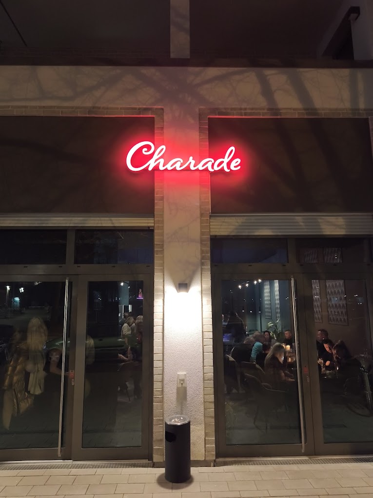 Cafe Charade Neon Logo